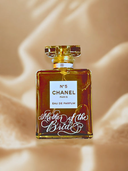 Personalized Chanel No. 5 Perfume bottle with “Mother of the Bride” engraving — timeless wedding gift idea for bride, bridal party, and keepsake photos.