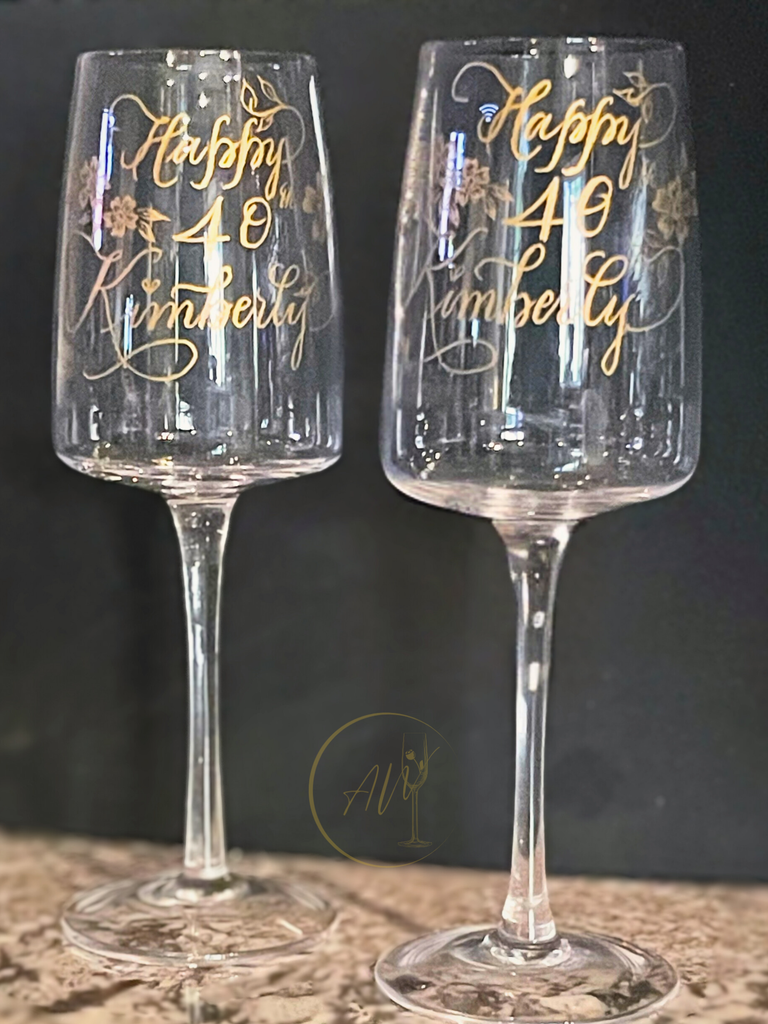 Personalized engraved wine glasses with gold calligraphy birthday design by A Wincy Glass N Design